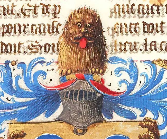 A heraldic bestiary lion bust with a human-like face